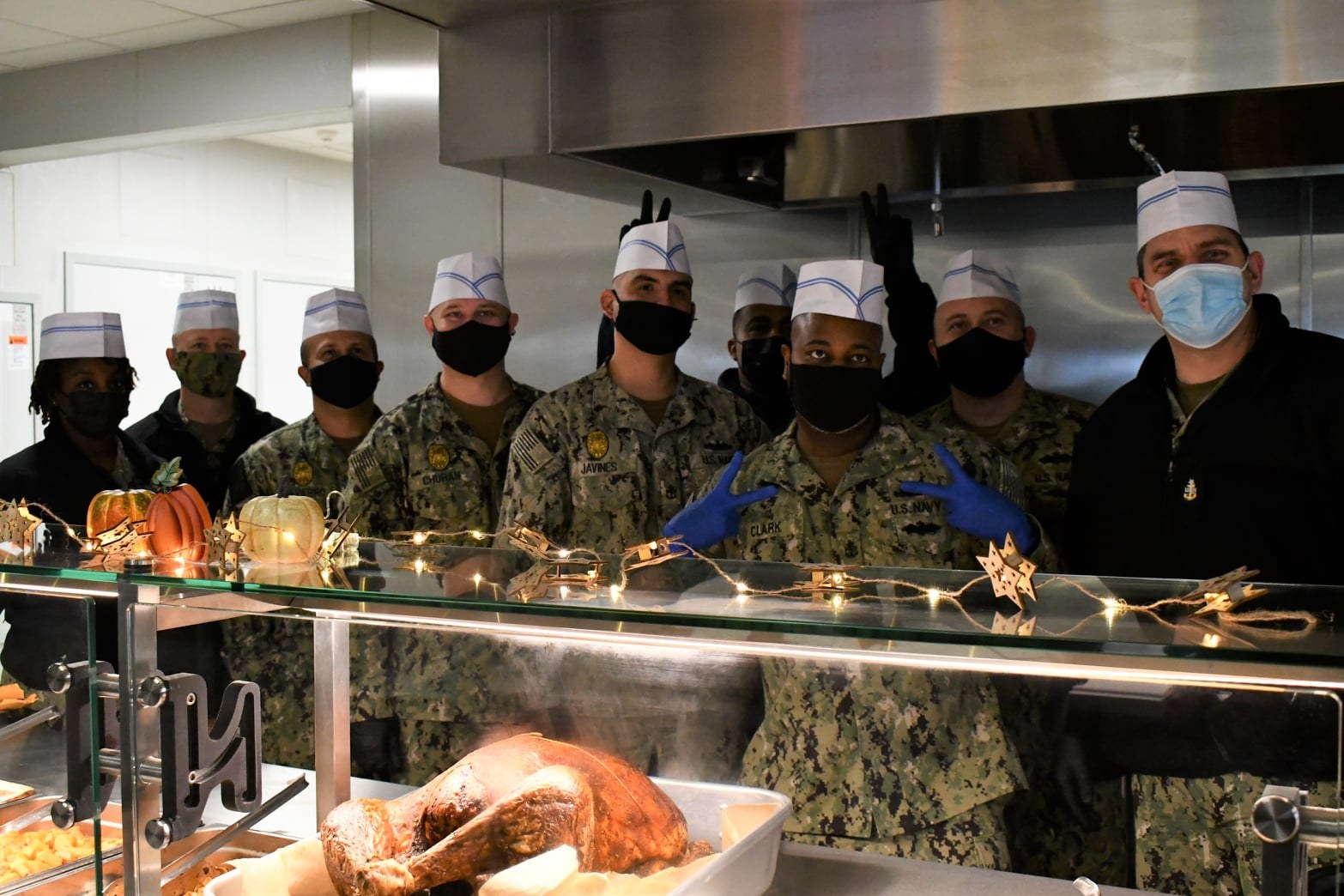 US Navy personnel at the Eagles Landing Café serving line inside GORT-equipped kitchen at NSF Redzikowo, Poland